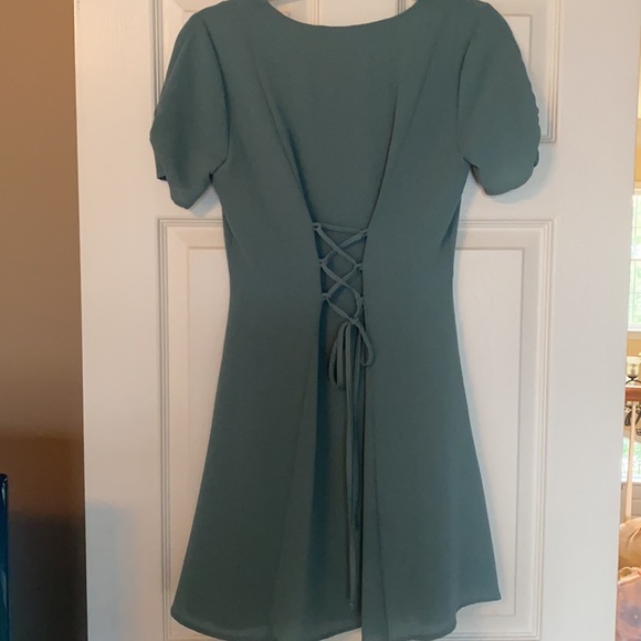 Feminine button down dress with a fitted waist - Picture 2 of 4
